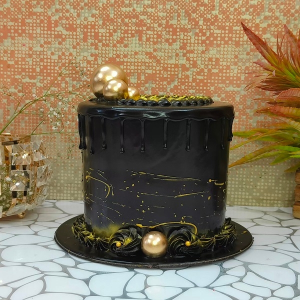 Dark Chocolate Cake with Black Piller & Golden Balls