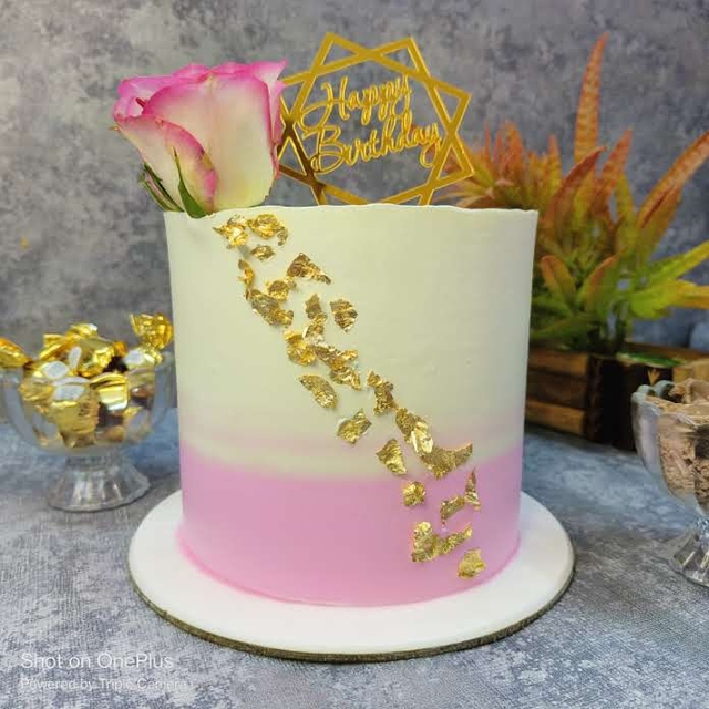 Pink Pillar Cake With Flowers Topping