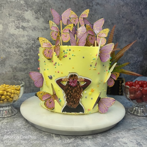 Pineapple Cake With Batterfly Design Topping