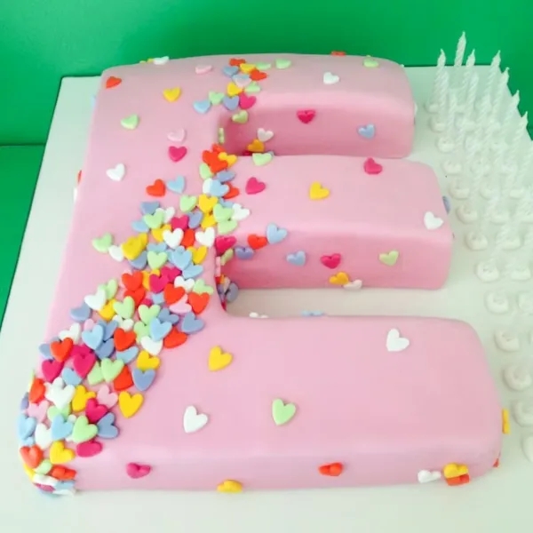 Pink Creamy E Alphabet Cake